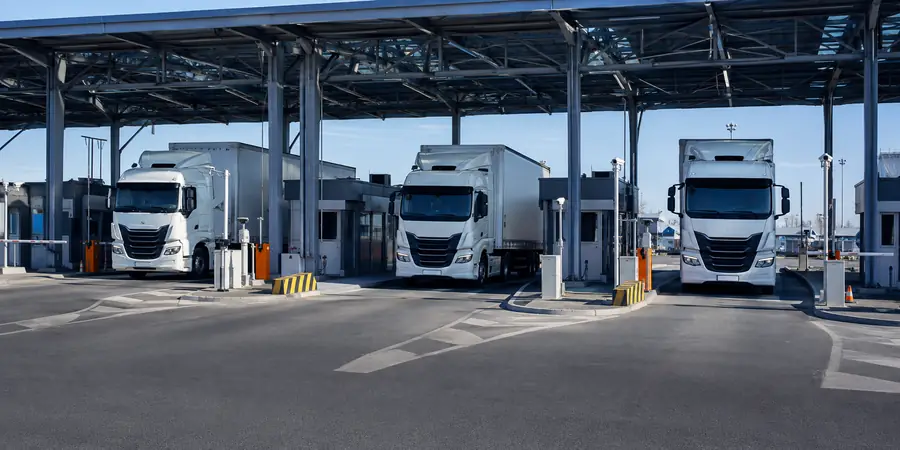 Freight vehicles at a customs inspection facility