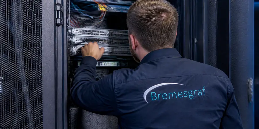 Engineer carrying out maintenance on installed equipment