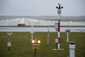 Weather observation sensors beside a runway